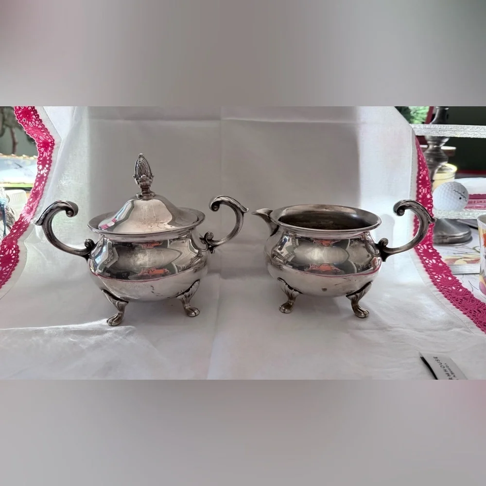 vintage EPCA Bristol by Poole ornate silver-plated sugar bowl and a creamer.
